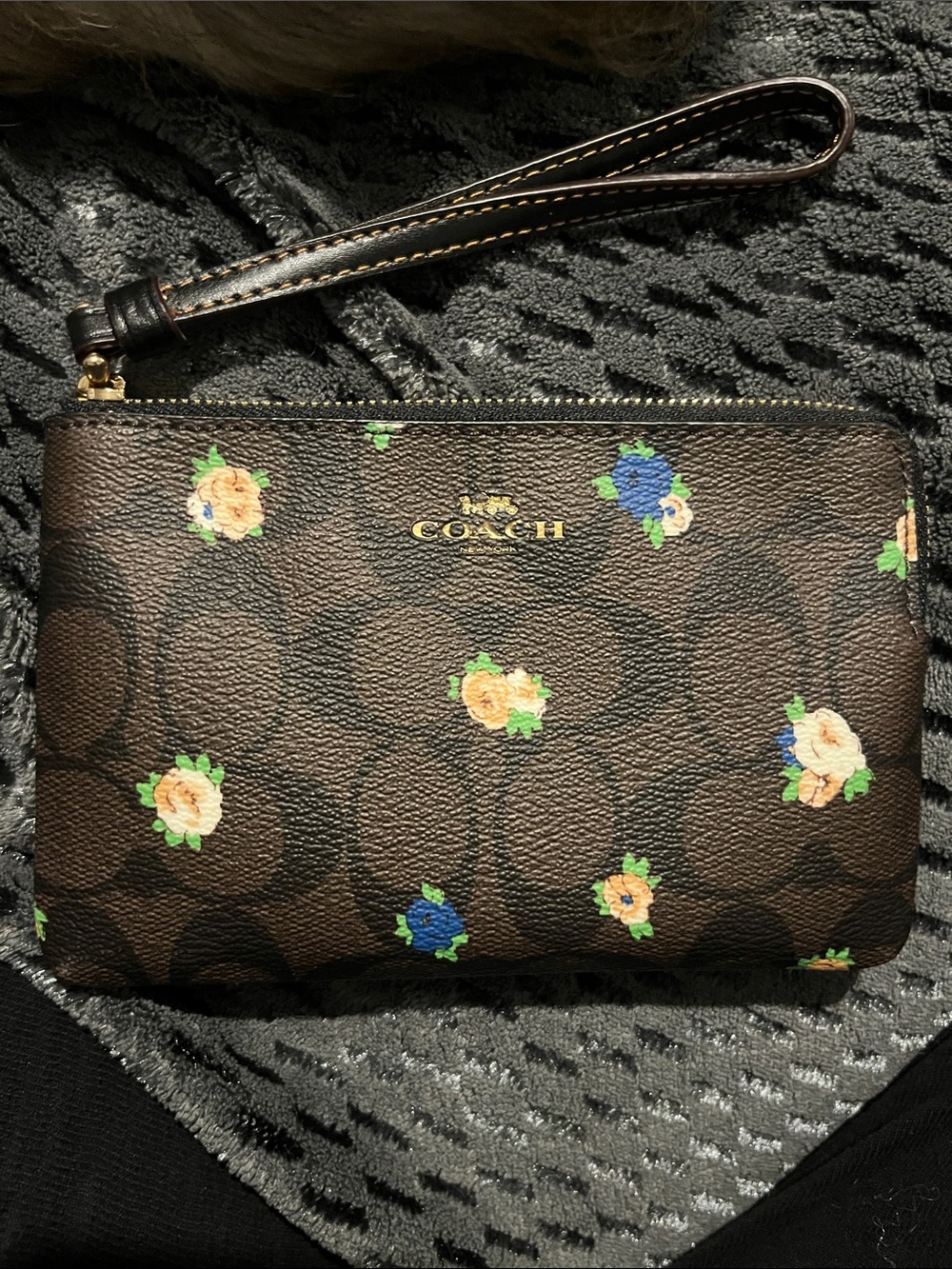 Coach Brown Signature Floral Wristlet with Green and Blue Accents